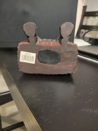 Salvadanaio con motociclista