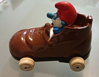 Grande Puffo pilota auto scarpa