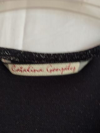 Blusón con efecto brillante. talla 48