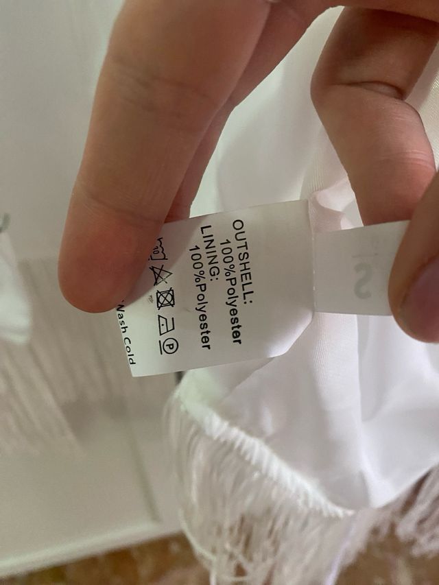 giacca bianca con frange