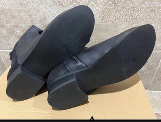 Botas altas de piel y tejido