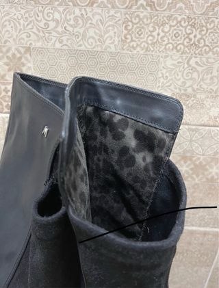 Botas altas de piel y tejido