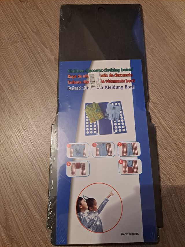 Doblador ropa niños