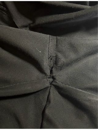 remiendo de pantalon de trabajo