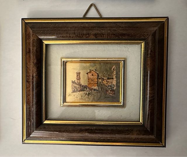 Nr10 quadretti doppio su lamina dorata.