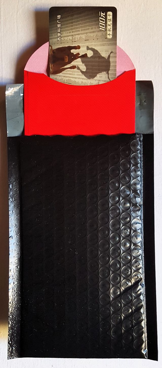 Tarjeta telefónica (toro) + moneda 1 yuan (2007)