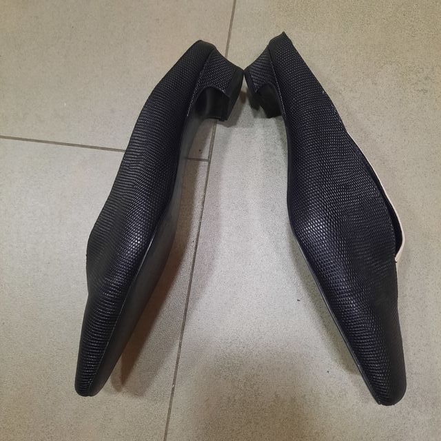 Mulé blanco y negro Uterque poco uso no envío.