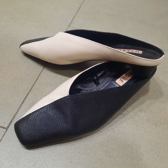 Mulé blanco y negro Uterque poco uso no envío.