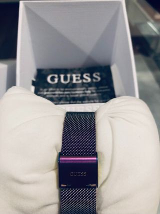 Reloj de la marca Guess con  su garantia