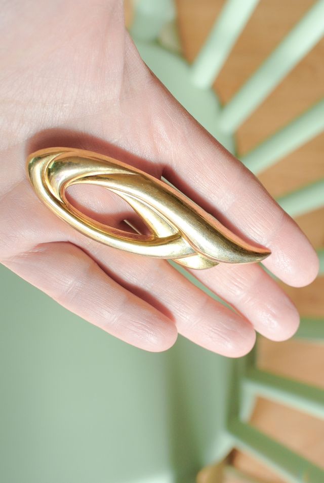 Spilla dorata vintage art decò