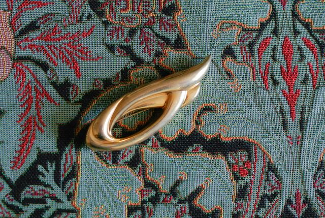 Spilla dorata vintage art decò