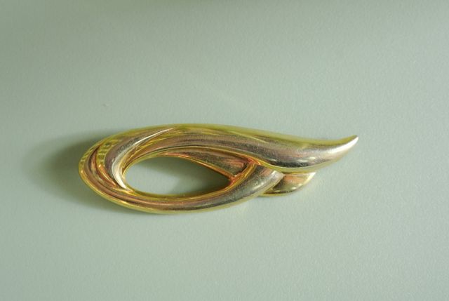 Spilla dorata vintage art decò