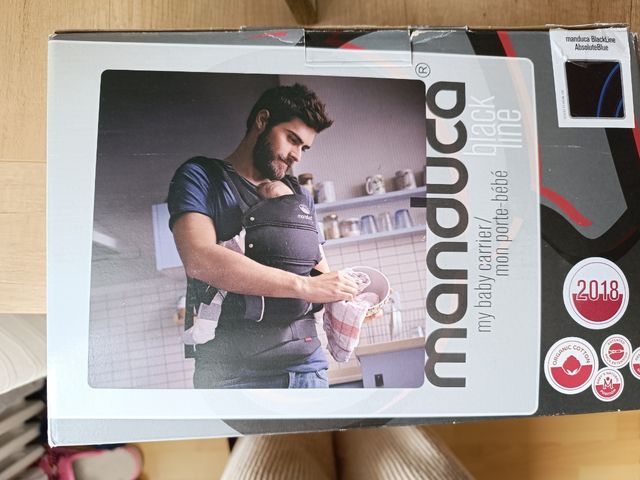 Mochila manduca poco uso