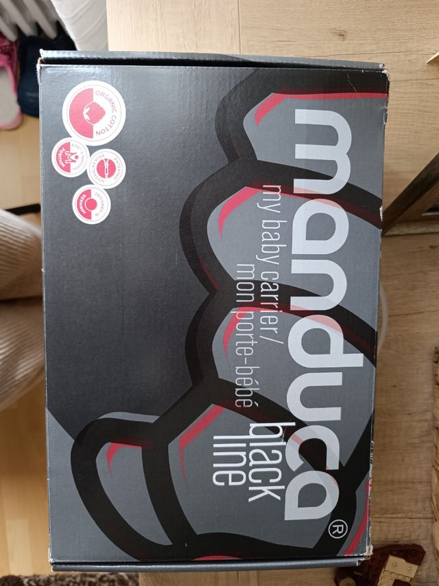 Mochila manduca poco uso