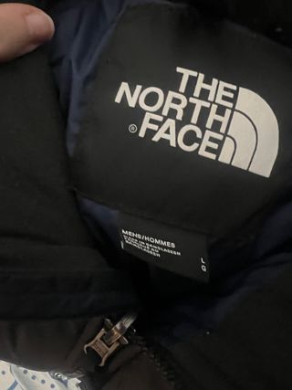 Chaqueta The North Face azul marino y negra