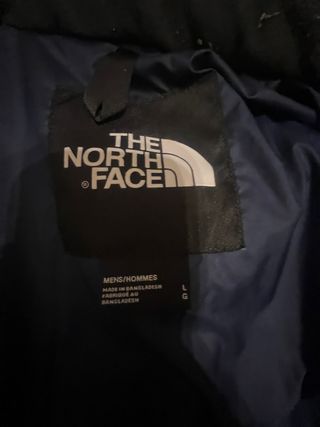 Chaqueta The North Face azul marino y negra