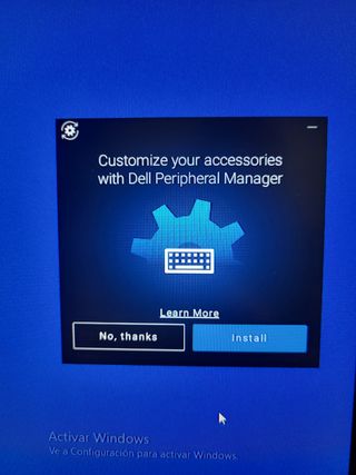 Ratón inhalambrico dell con dongle.