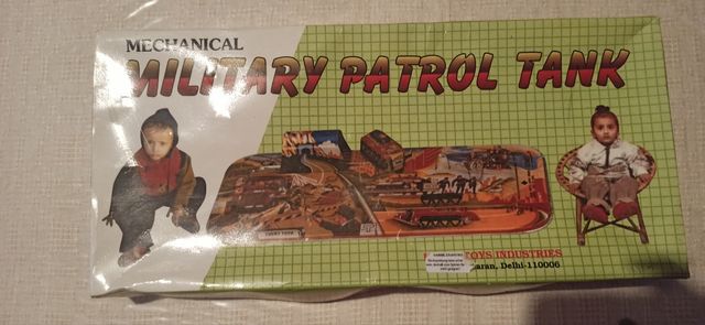 Gioco latta meccanico vintage