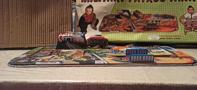 Gioco latta meccanico vintage