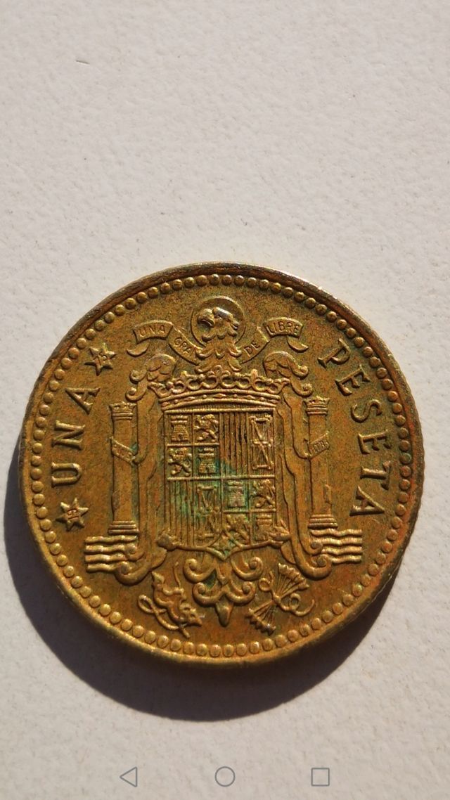 UNA PESETA