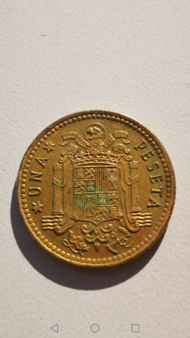 UNA PESETA