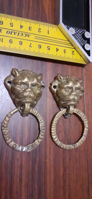 Bronce antigua pareja de tiradores cabezas de león