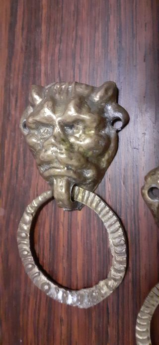 Bronce antigua pareja de tiradores cabezas de león