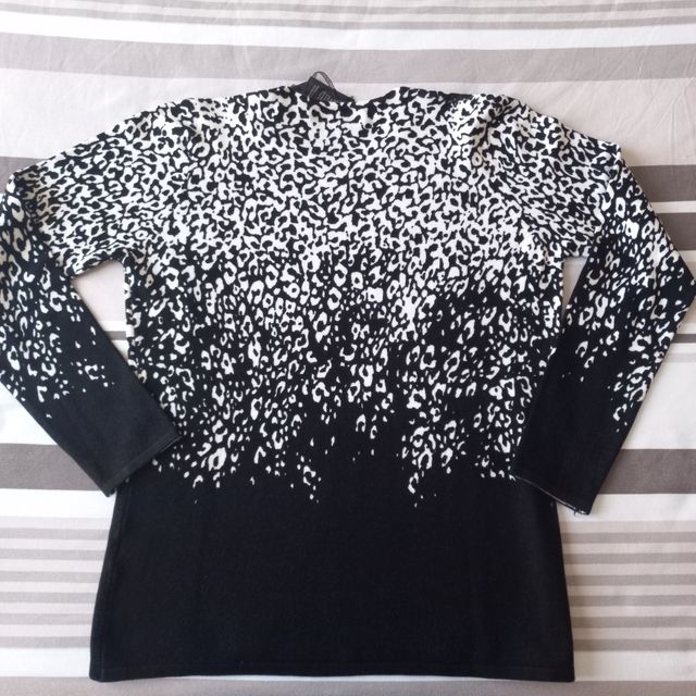 Maglia nuova con cartellino