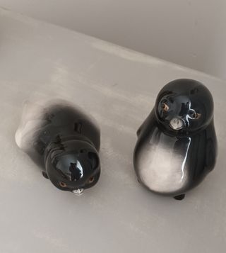 Pareja pingüinos porcelana