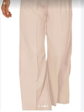 Pantalón de vestir pinzas. Zara