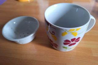 Tazza ceramica con filtro per te-tisane