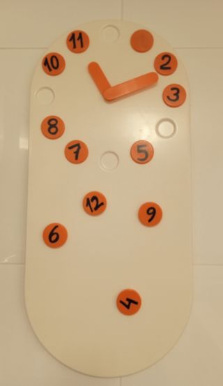 Reloj de pared con imán