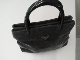 Bolso de mano. marca Caro