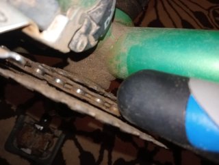 Bicicleta Kona verde reparar