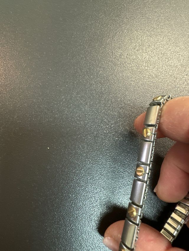 Pulsera  acero inoxidable  y piezas baño en oro