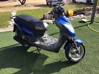 moto 125 scooter vendo o cambio por moto de campo