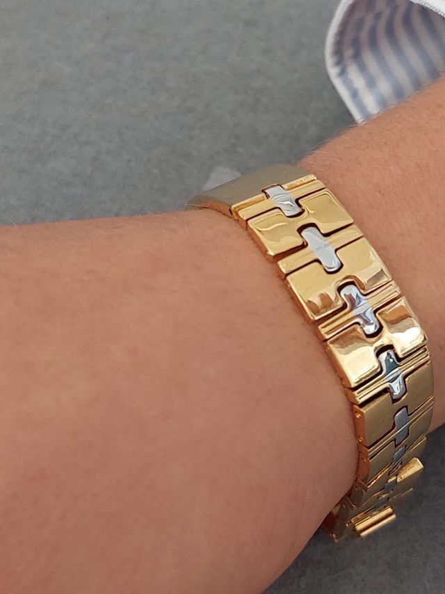 pulcera en acero tipo esclava en dorado