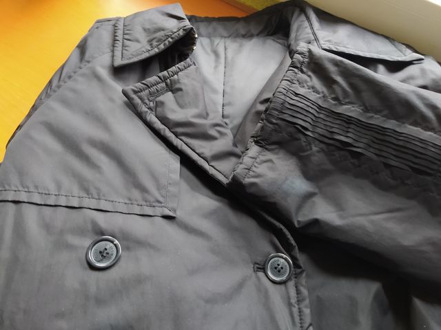 Abrigo negro de Síntesis