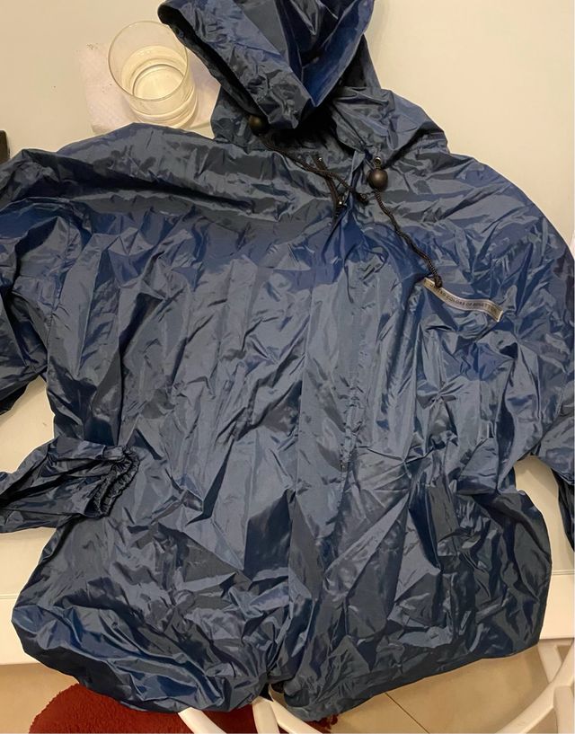 Zaino e impermeabile  nuovo unisex