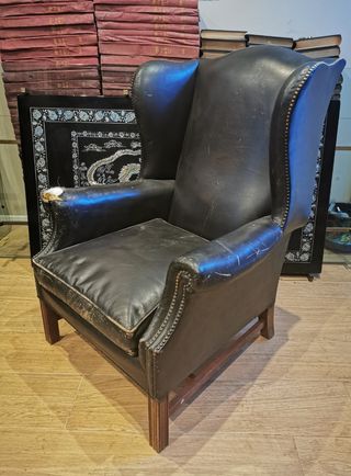Sillones orejeros piel. Negros