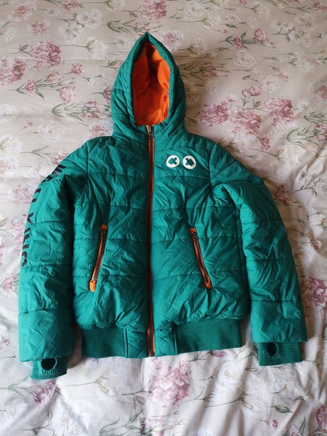 Piumino bambino taglia 12 verde salmone