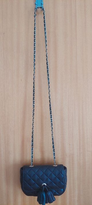 Mala a tiracolo Purificación Garcia