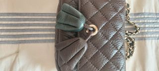 Mala a tiracolo Purificación Garcia