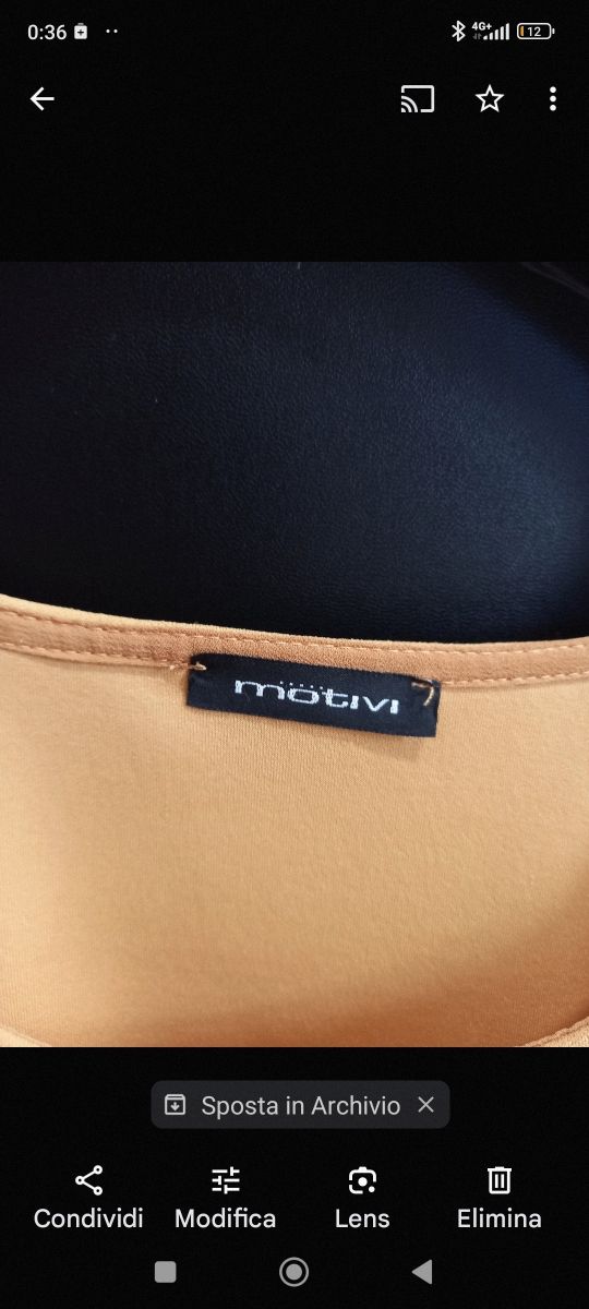 Blusa senape con trasparenze