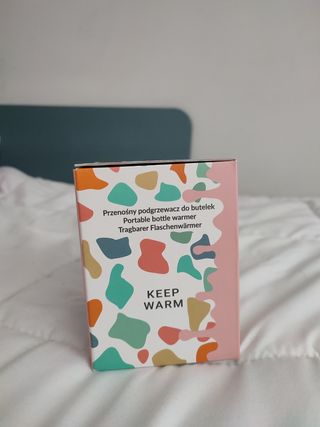 Calienta biberones portátil nuevo sin uso.
