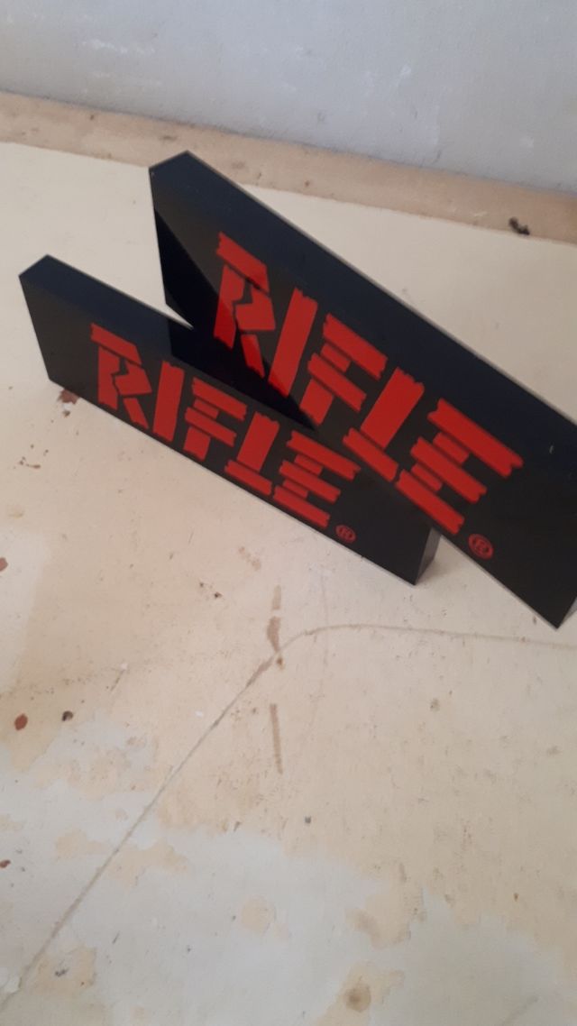 Insegna cartello Negozio abbigliamento RIFLE