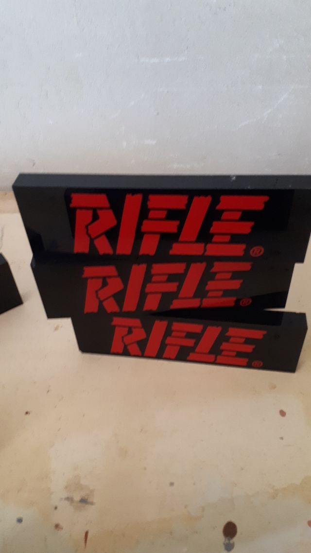 Insegna cartello Negozio abbigliamento RIFLE