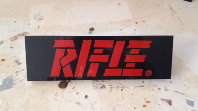 Insegna cartello Negozio abbigliamento RIFLE