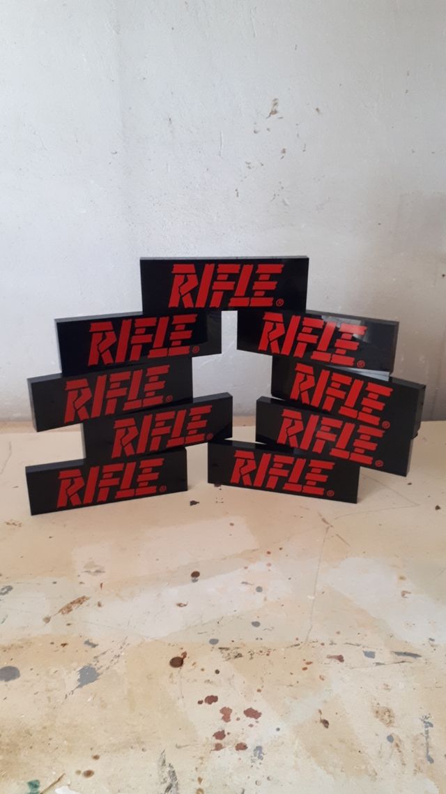 Insegna cartello Negozio abbigliamento RIFLE