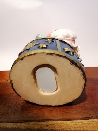 Salvadanaio rappresentante un neonato